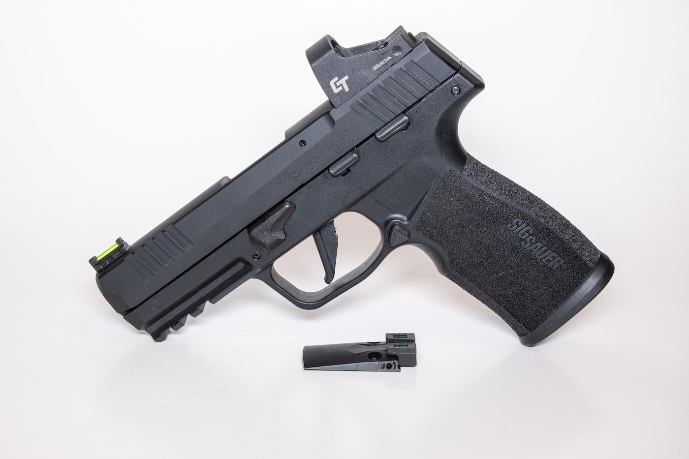 Sig Sauer P322 Handgun with a mini reflex sight.