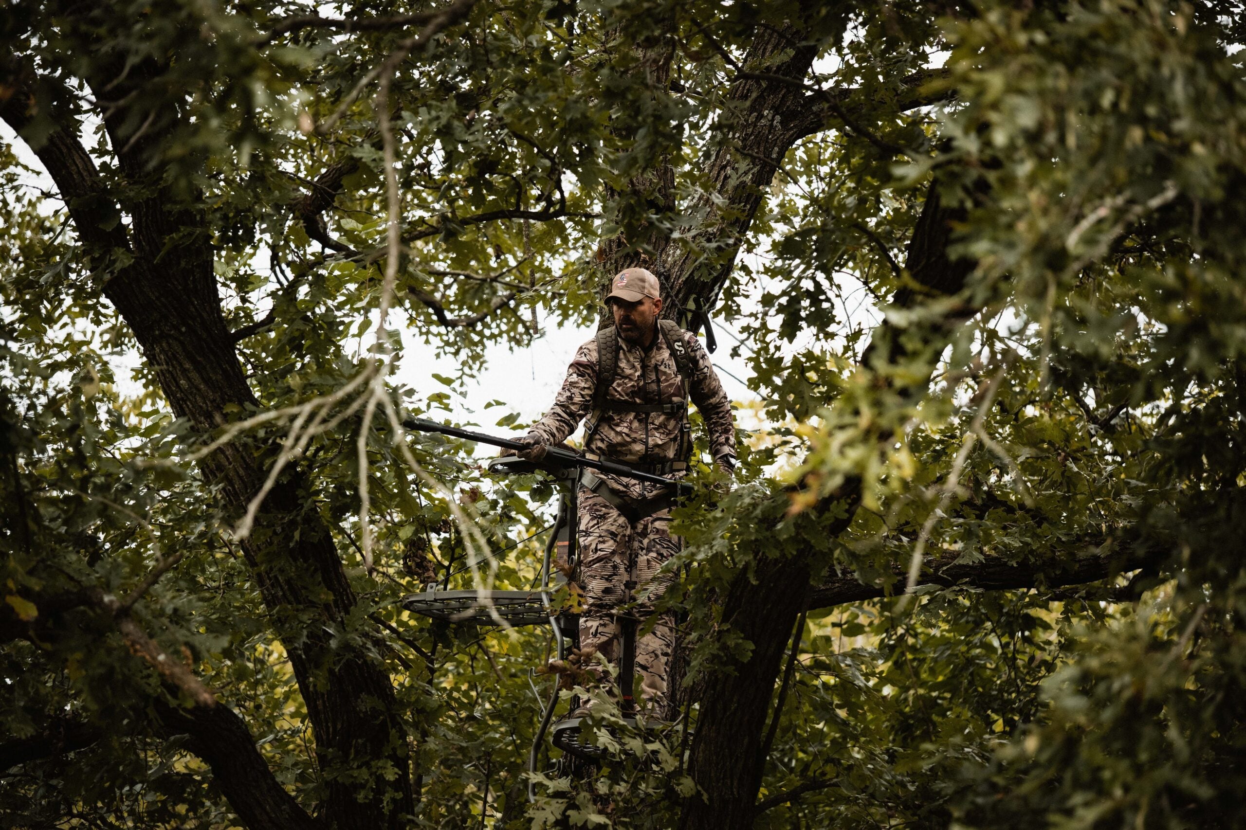 photo of hunter in tree stand