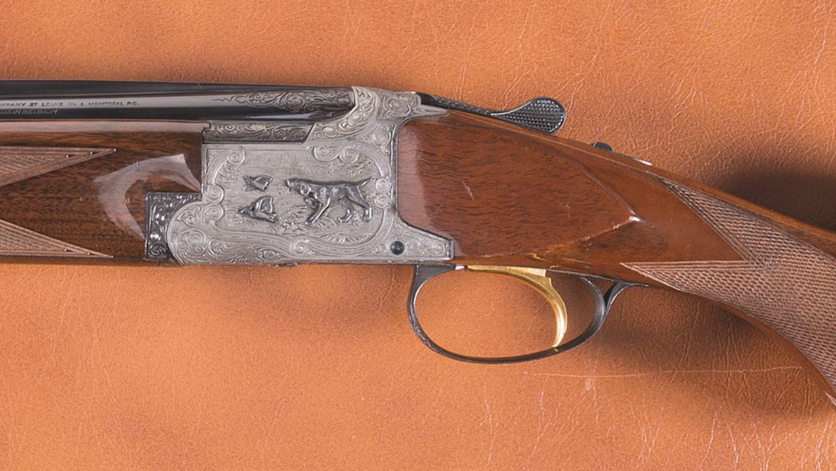 Browning superposed shotgun with engraving