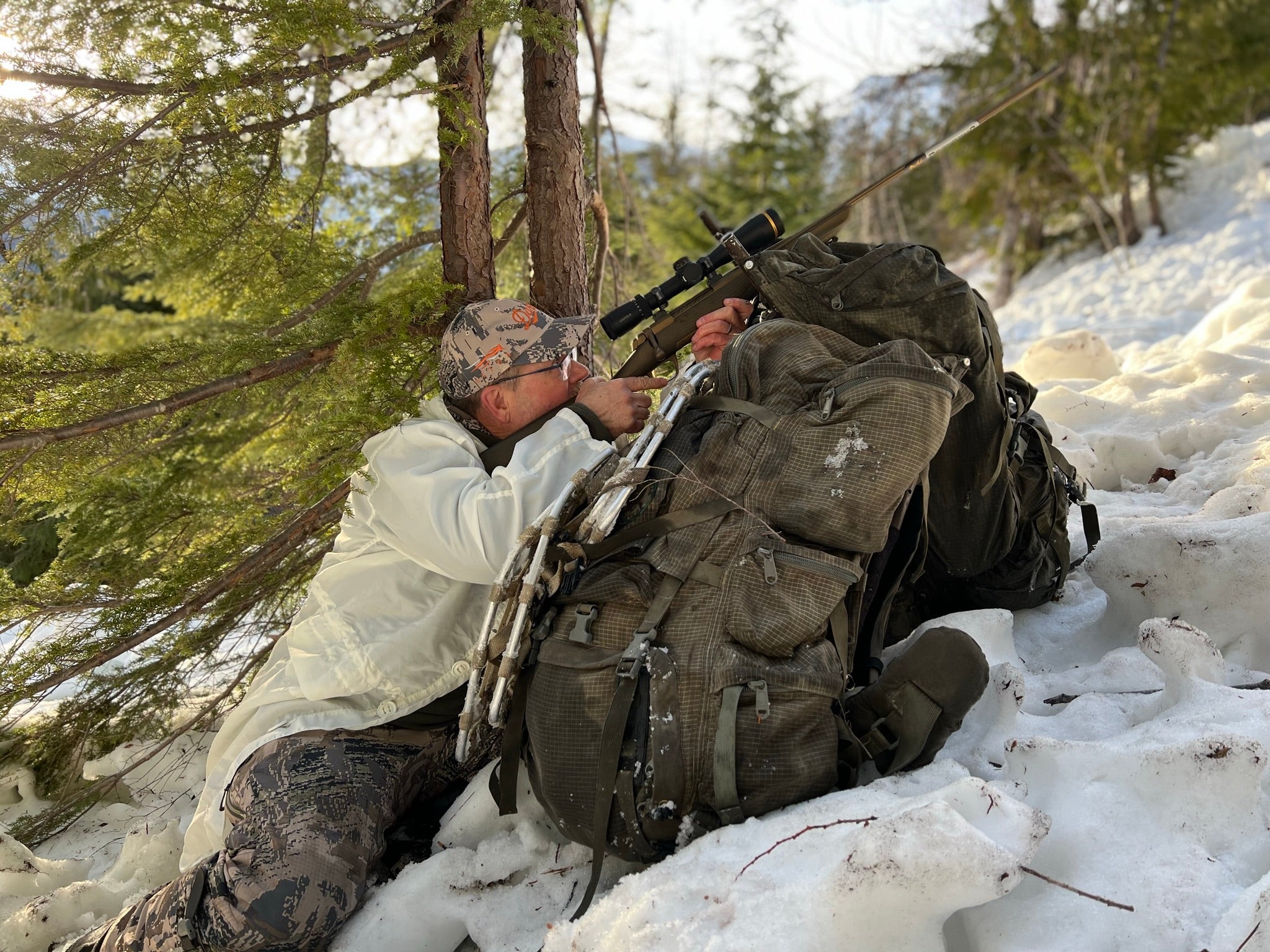 hunter shoots at a mountain goat