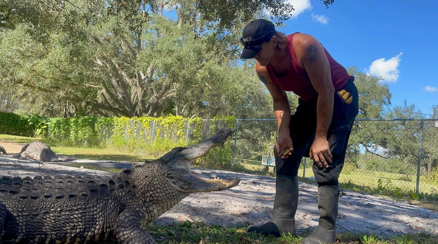 The Florida wildlife expert lost much of his arm after a large gator clamped down on his hand and went into a roll.