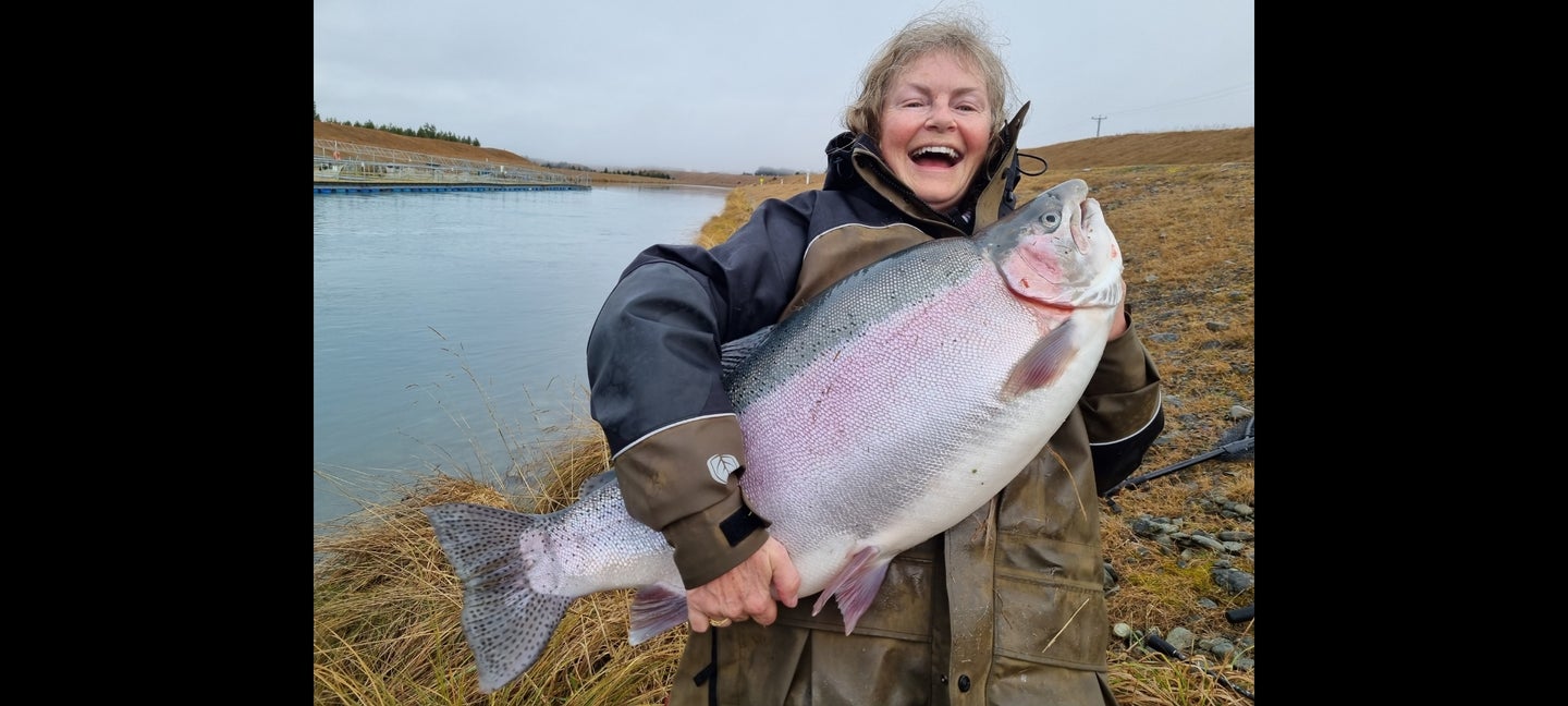 Rae Bushby caught a huge rainbow trout in new zealand