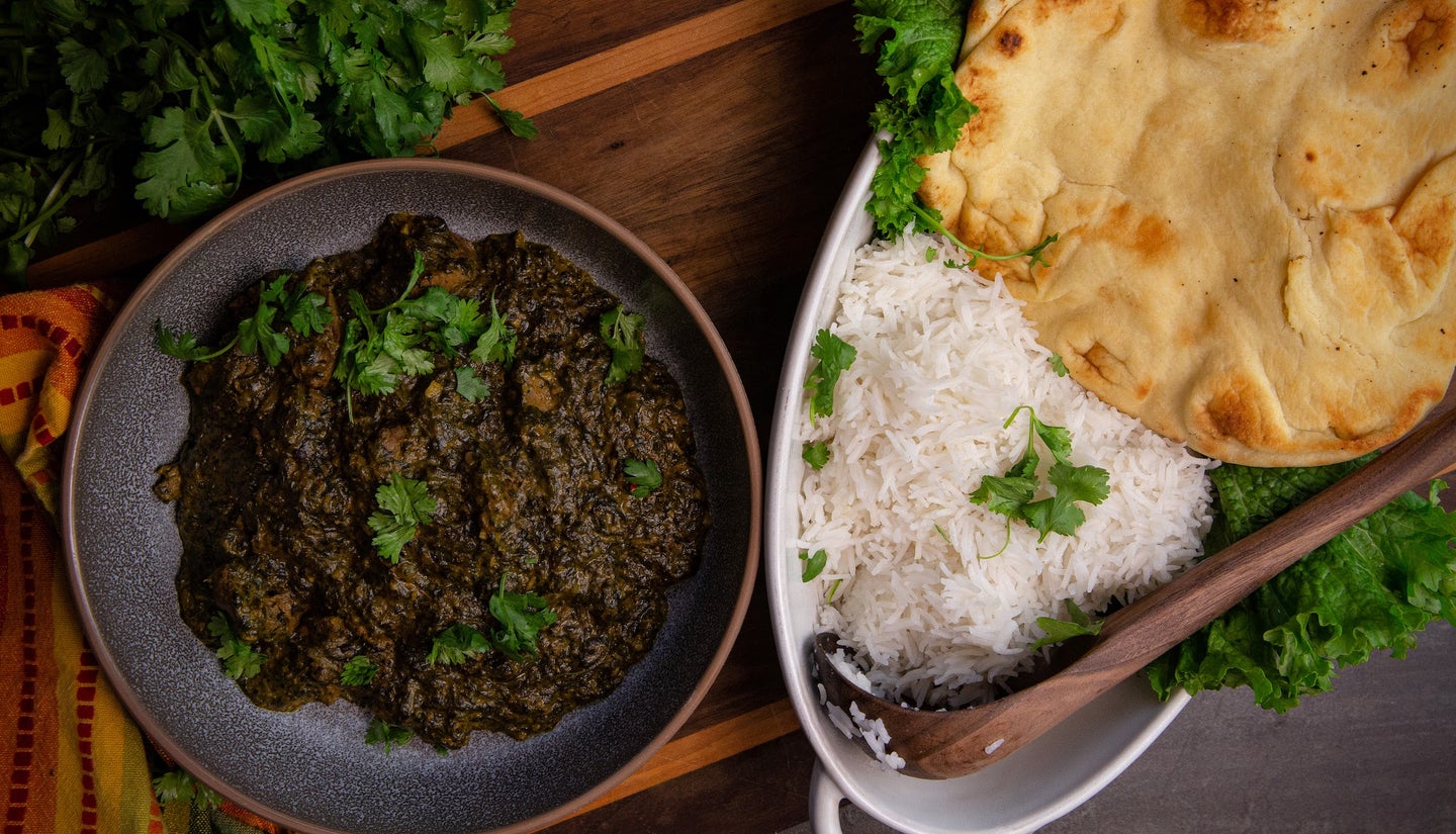 venison saag with rice and naan bread.