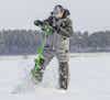 Angler wearing StrikerICE Apex Bibs while ice fishing