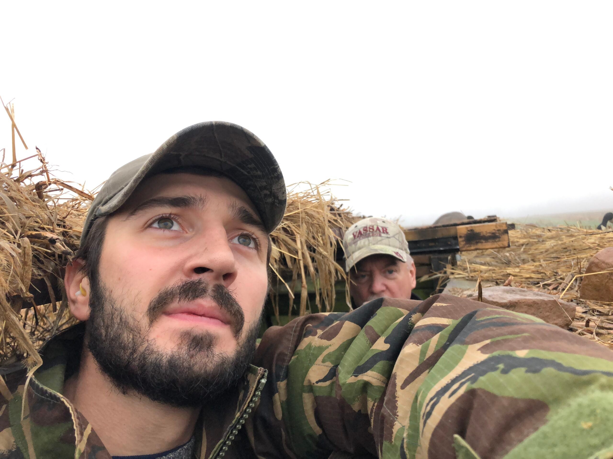 Two goose hunters in a blind.