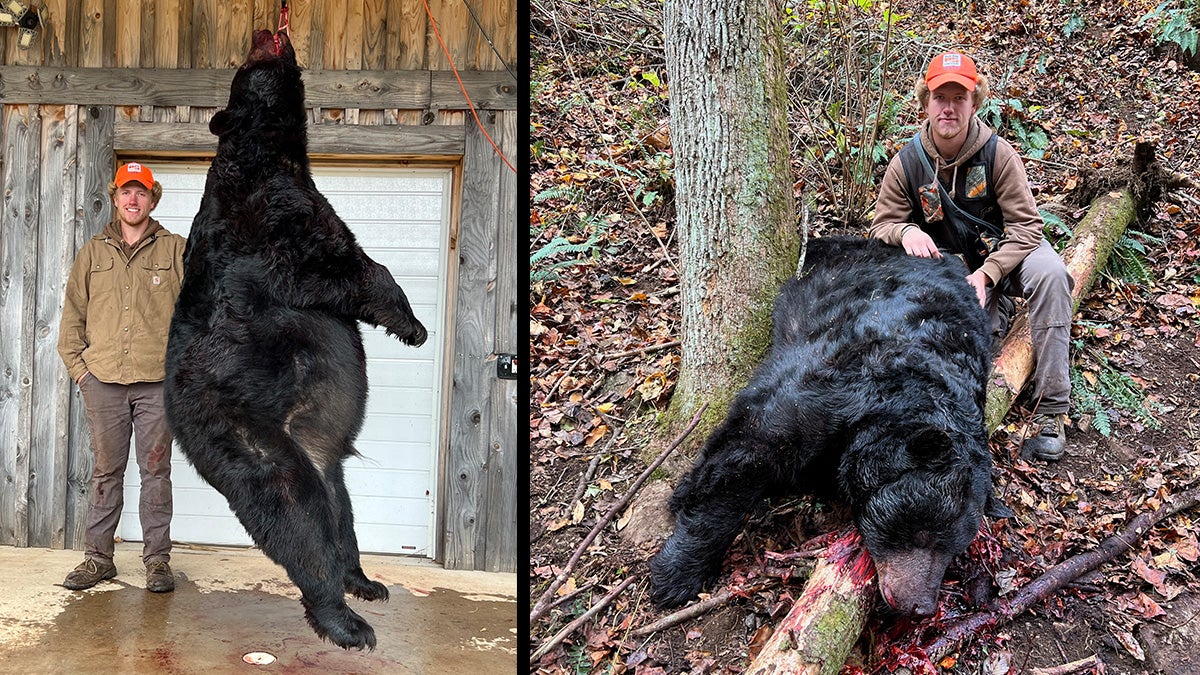 hunter poses with giant black bear
