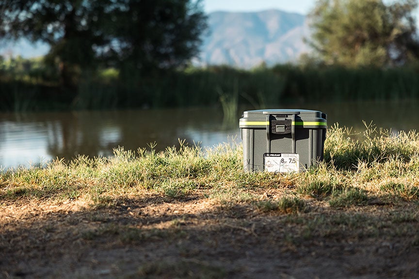 The new Pelican 8-Quart Personal Cooler with lake in the background