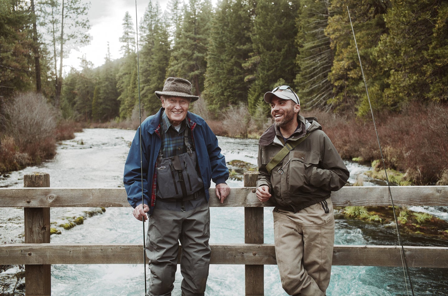 Volker Oakey (left) and Eben Pindyck take a break from fly fishing on Oregon's Metolius River.