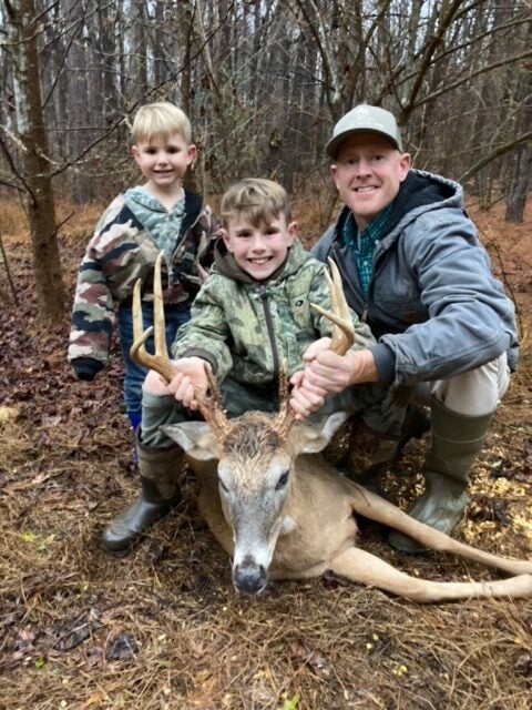 family photo after a deer hunt