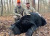 Parrot and his guide Billy Barber posed with the massive bear immediately after the hunt. 