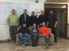 group of wild pig researchers pose for photo