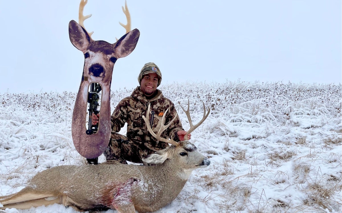 The author after a successful hunt with the Mule Deer Stalker Decoy.