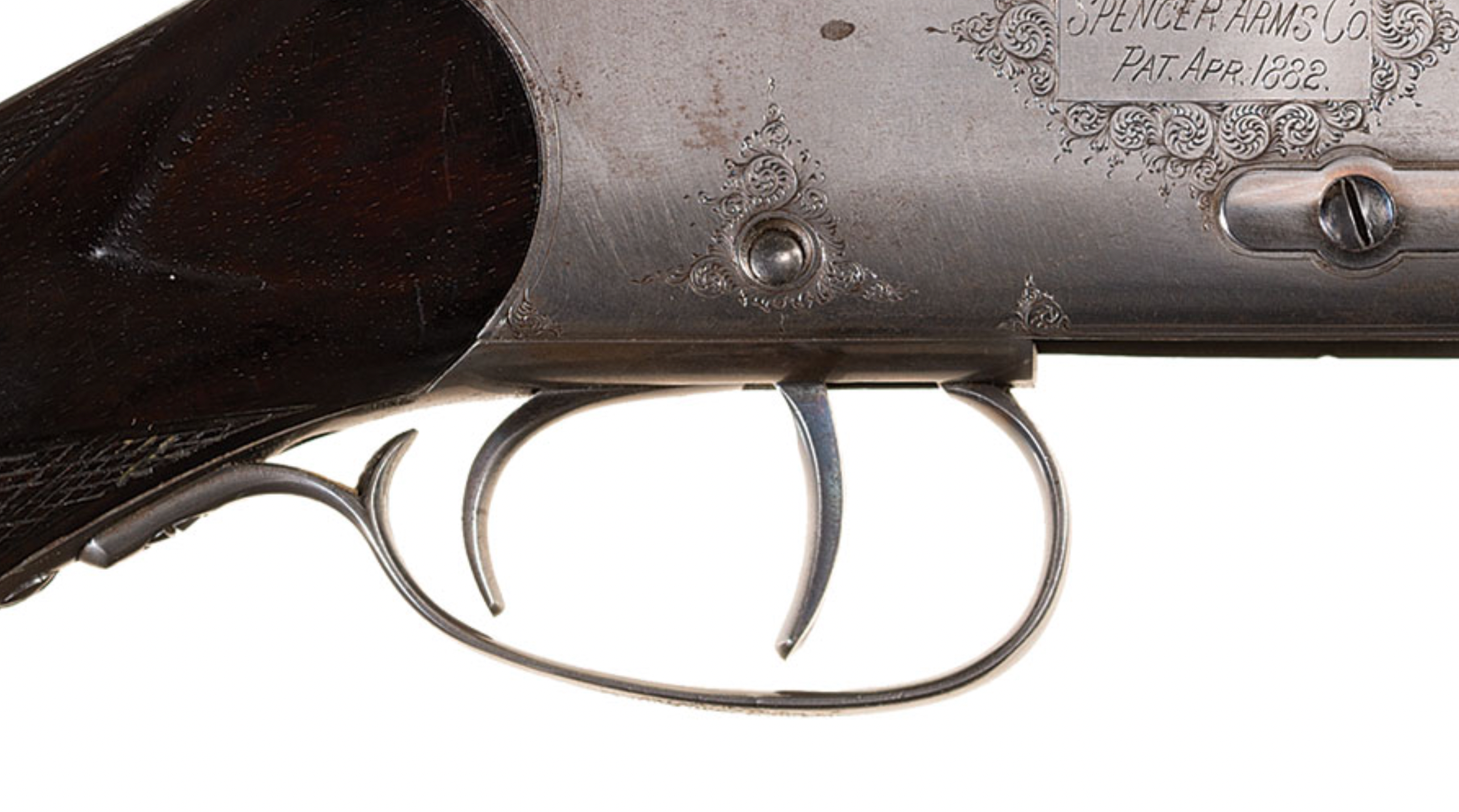 The two triggers on a spencer roper slide action shotgun.
