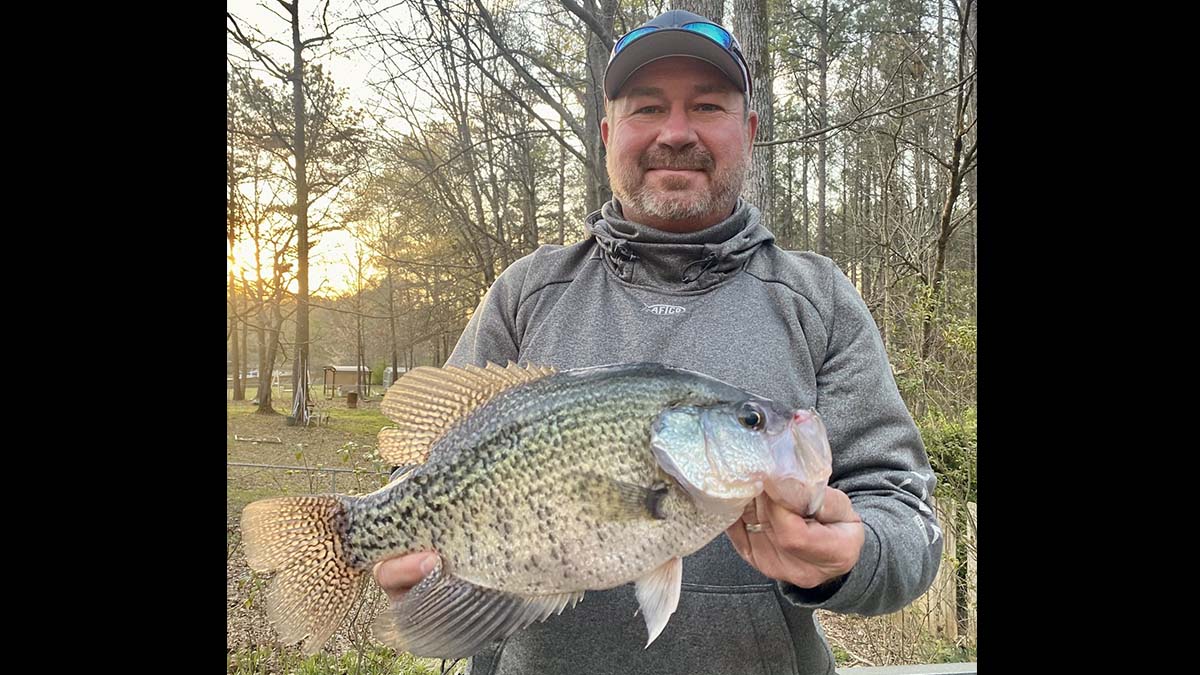 man holds large crappie