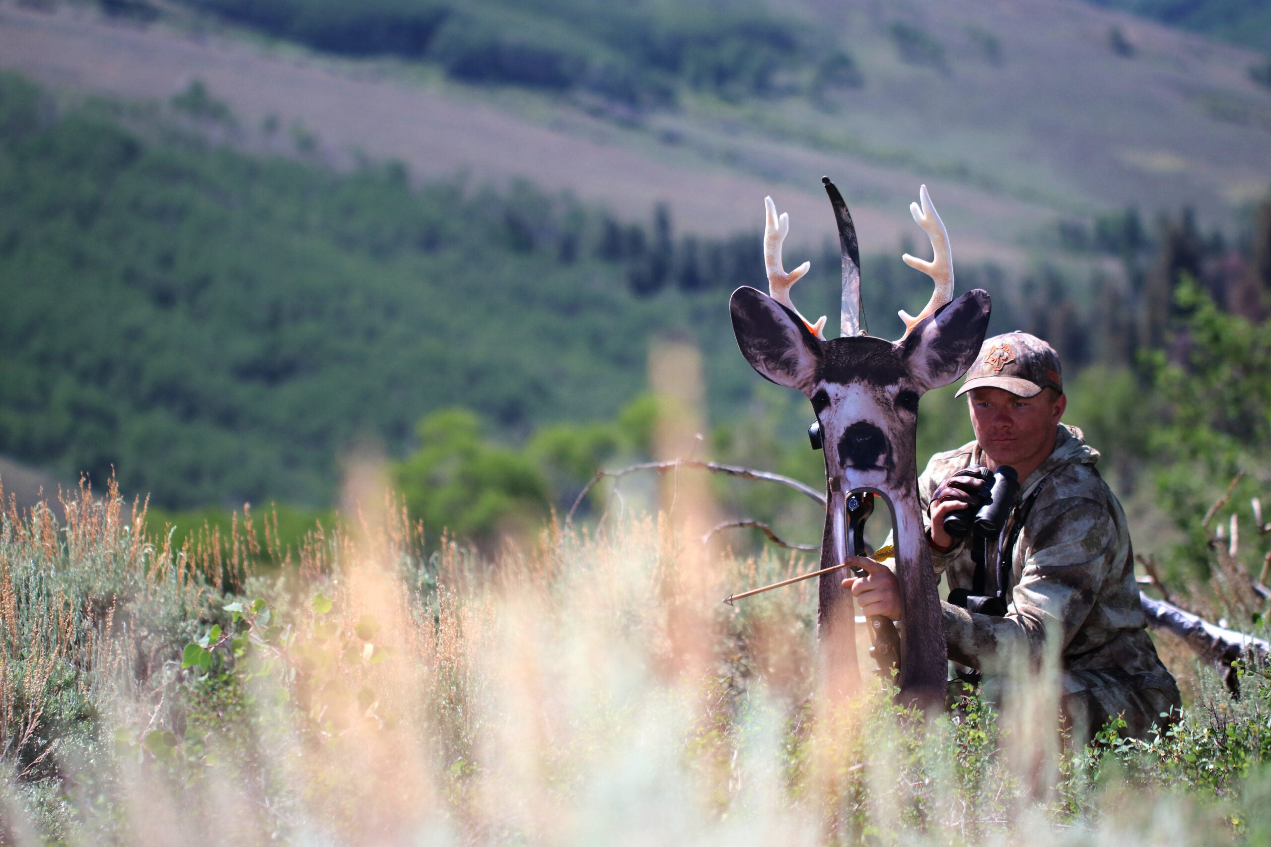 photo of hunter with mule deer hunting decoy