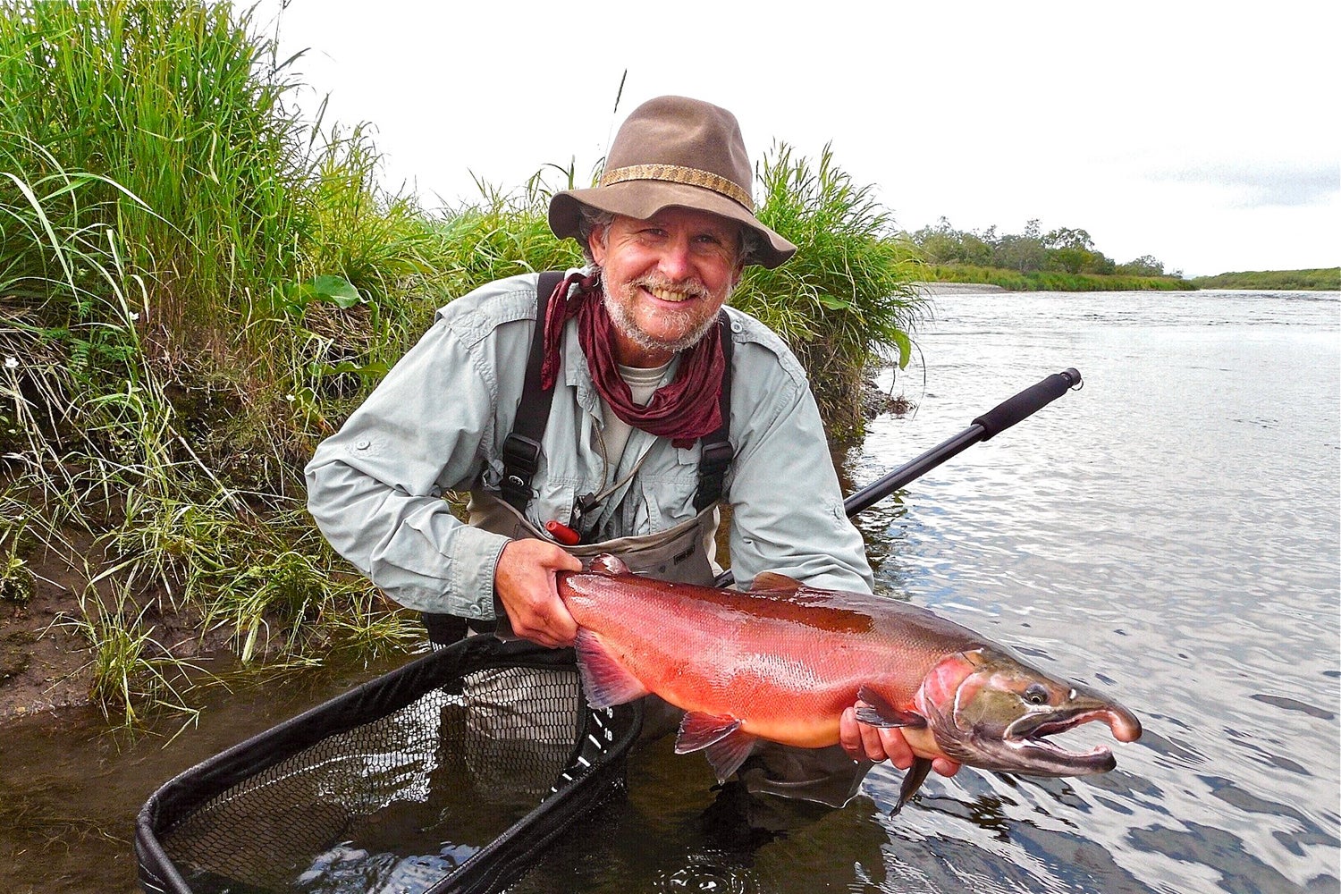 angler holding big salmon