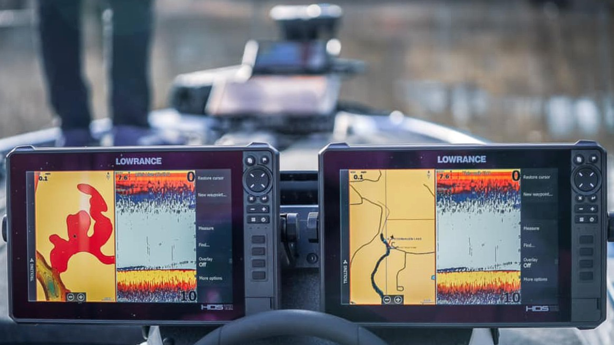 A pair of Lowrance fish finders on a boat