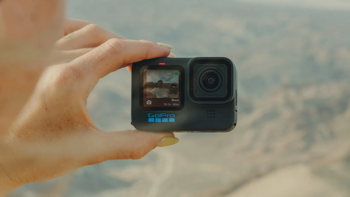 Woman taking a video with GoPro HERO11 Camera
