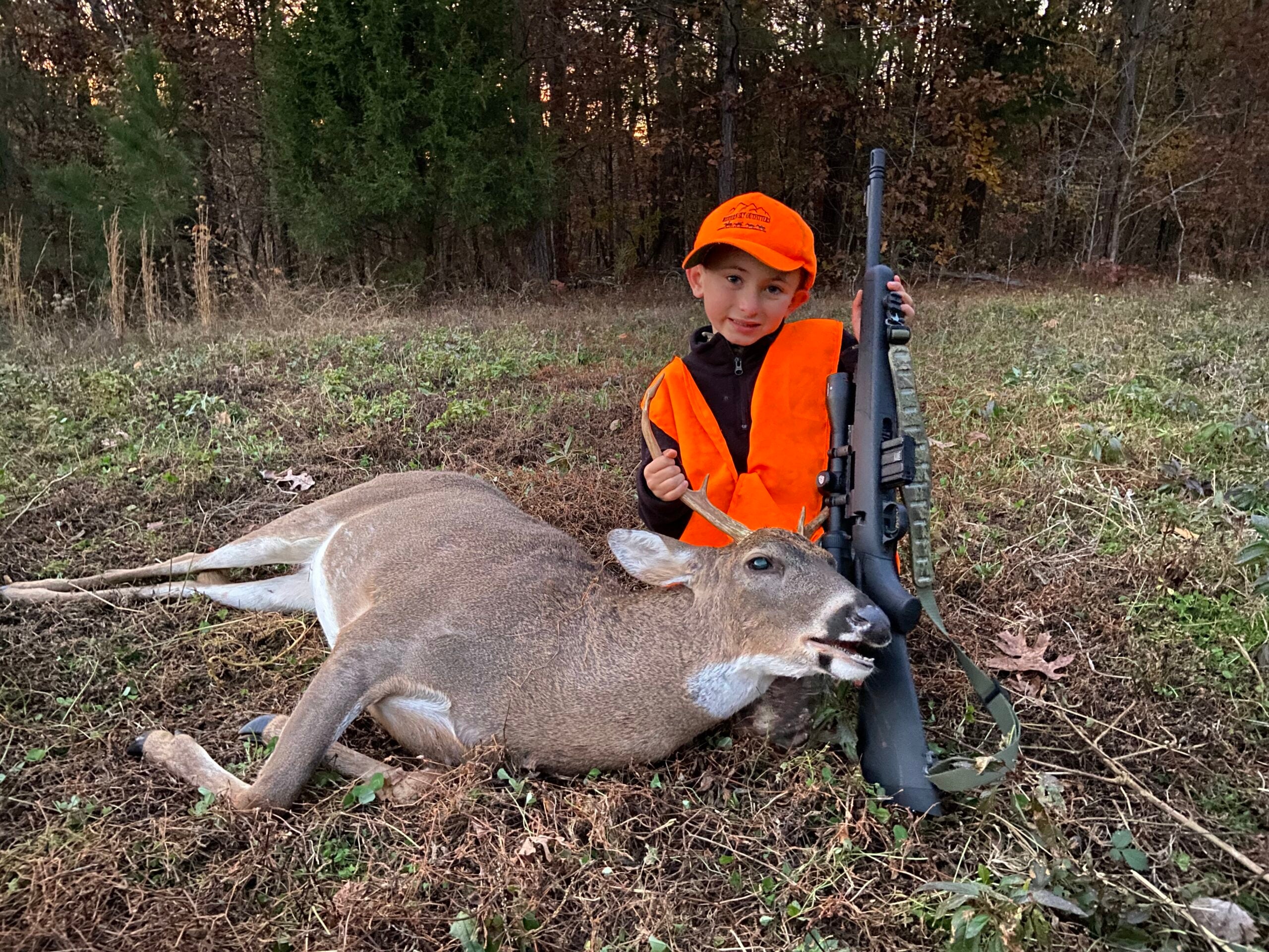 photo of the author's son with a nice buck he took