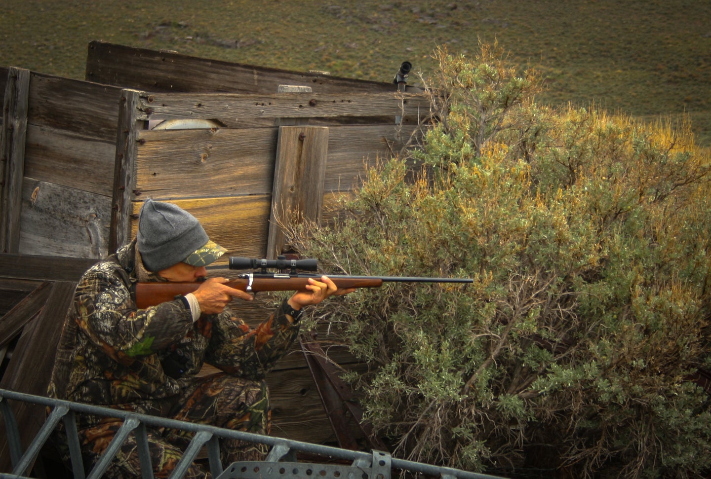 Hunter shooting .22 LR rifle