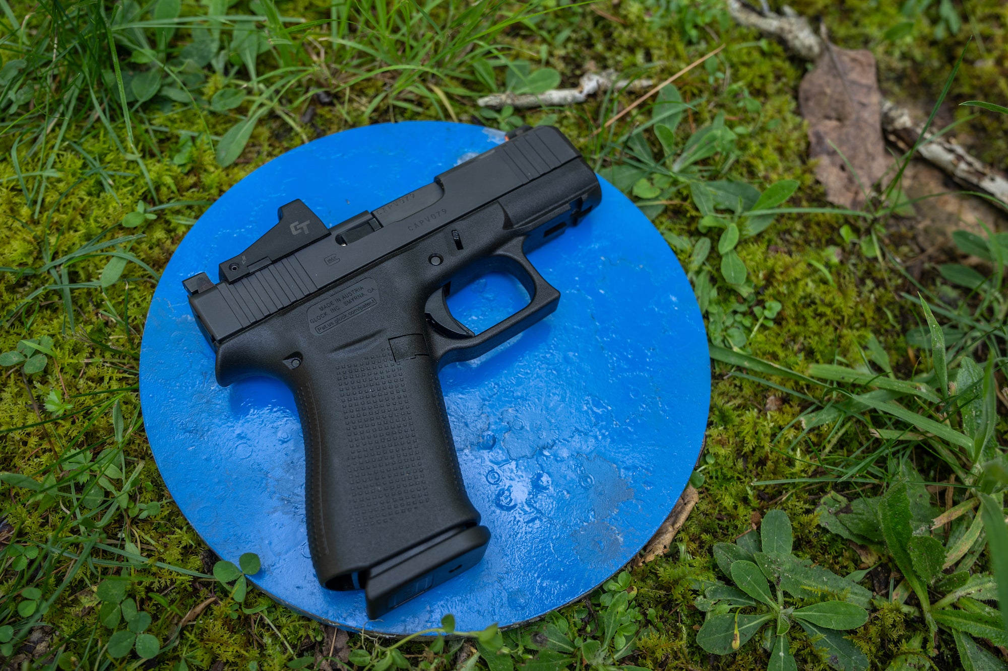 photo of a Glock pistol on steel target