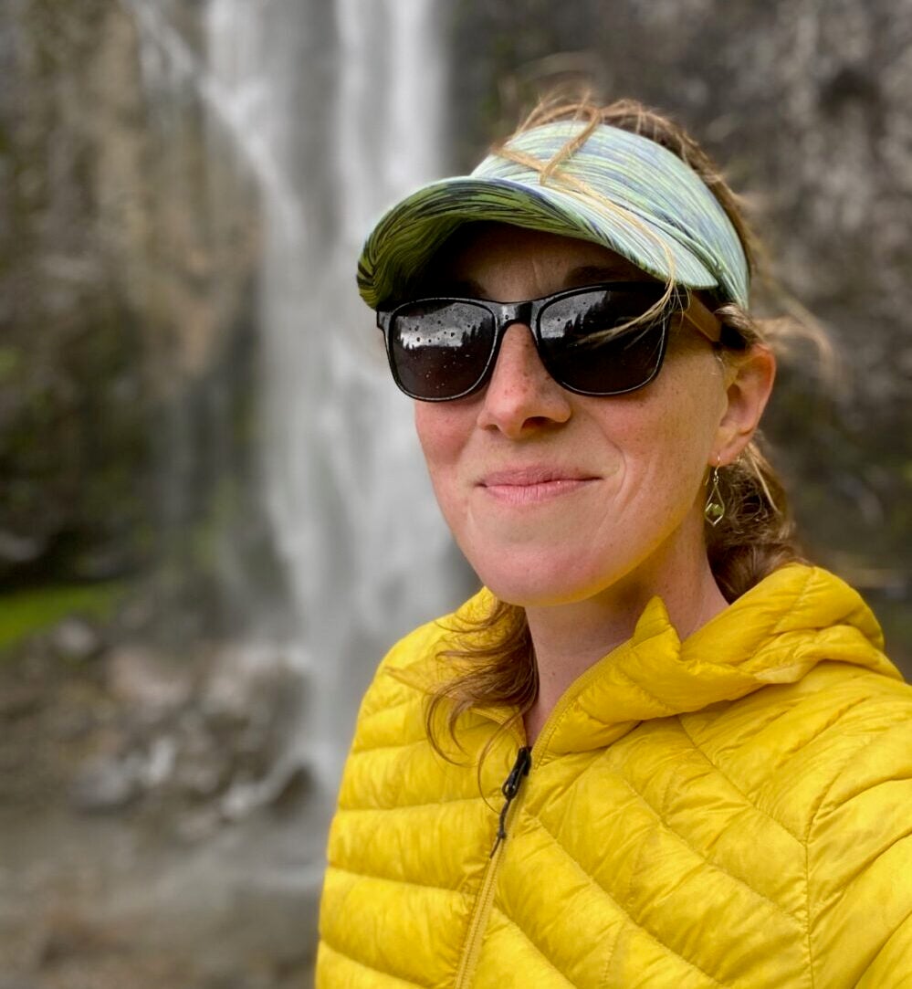Woman wearing Shwood Camp Trail sunglasses for hiking