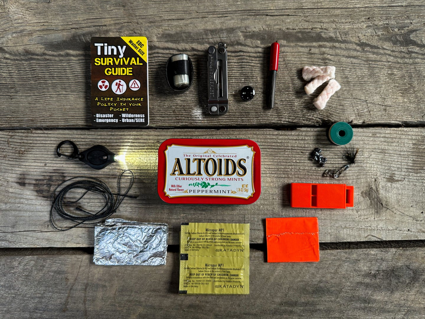 survival tools that go inside an Altoids survival kit