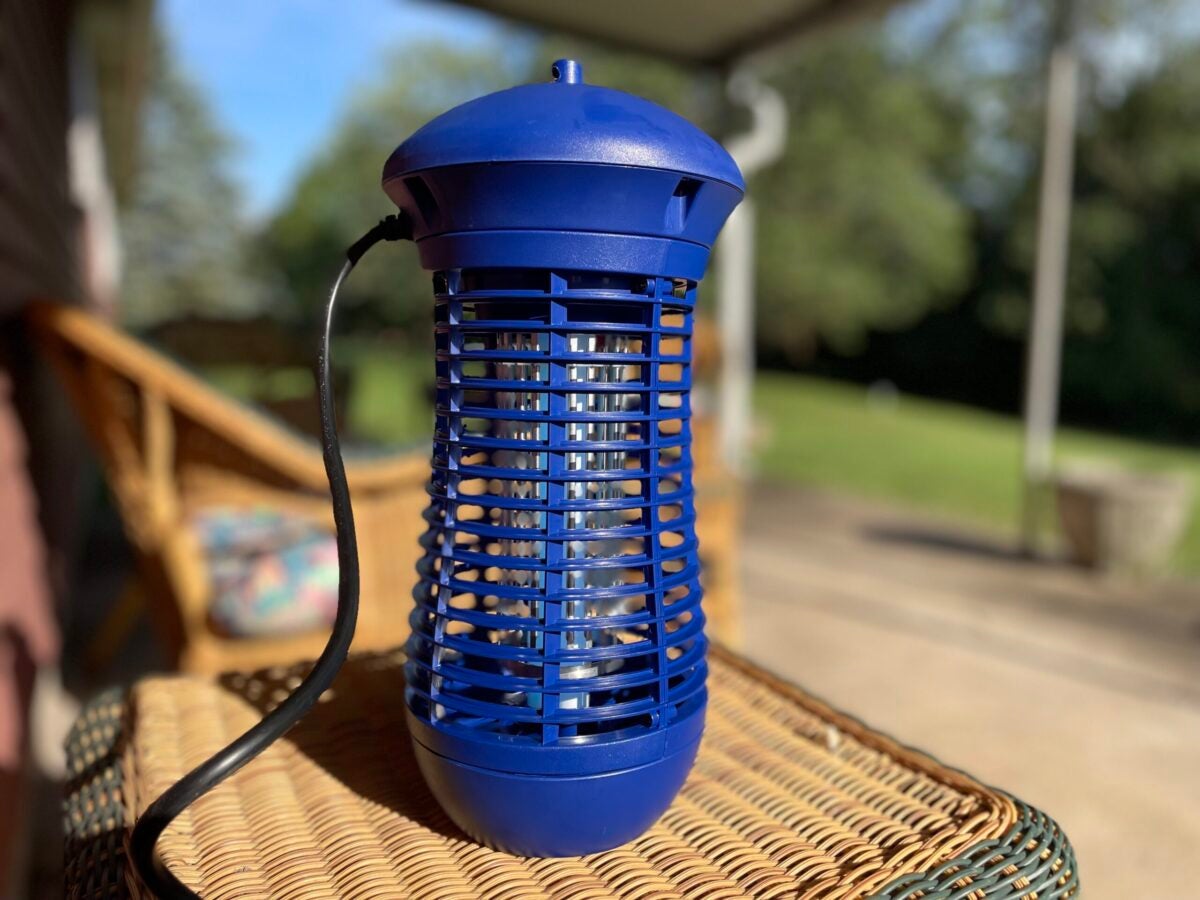 Livin' Well bug zapper sitting on back patio
