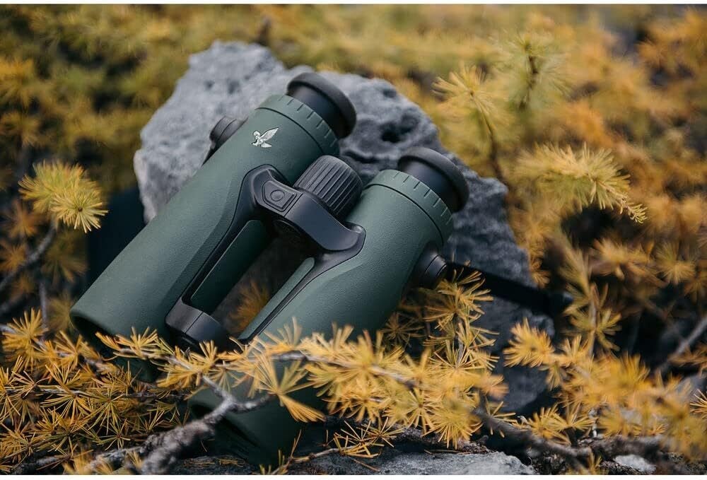 Swarovski El Range Rangefinder Binoculars sitting on ground