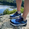 Woman wearing Brooks Cantamount 2 trail running shoes on a hike
