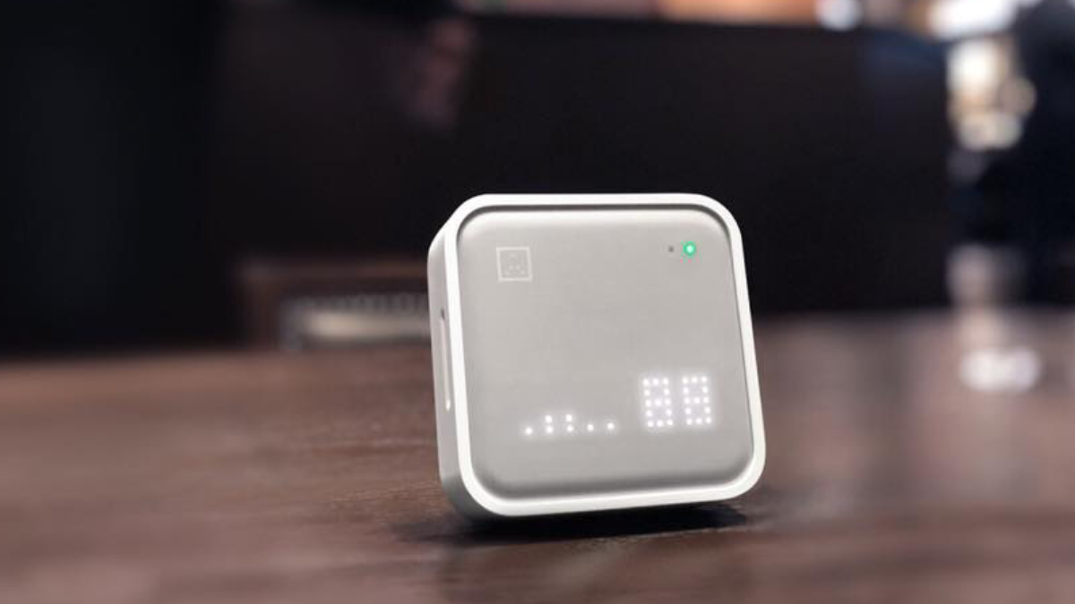 Awair Air Quality Monitor sitting on table