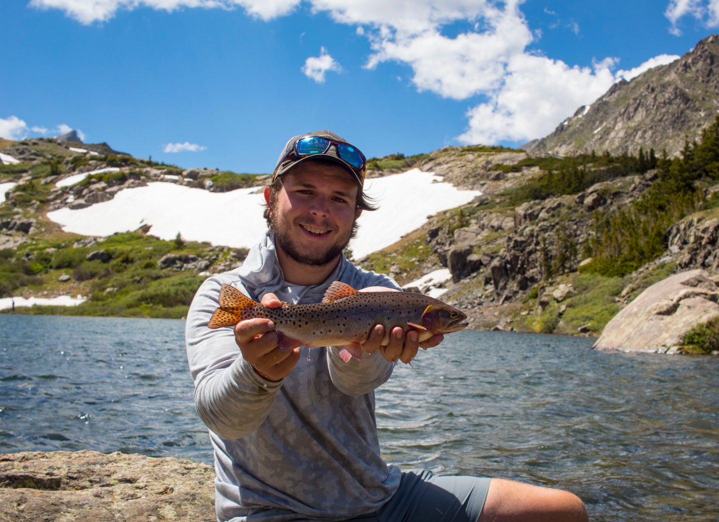 The author with a Colorado Cutthroat caught at an alpine lake.