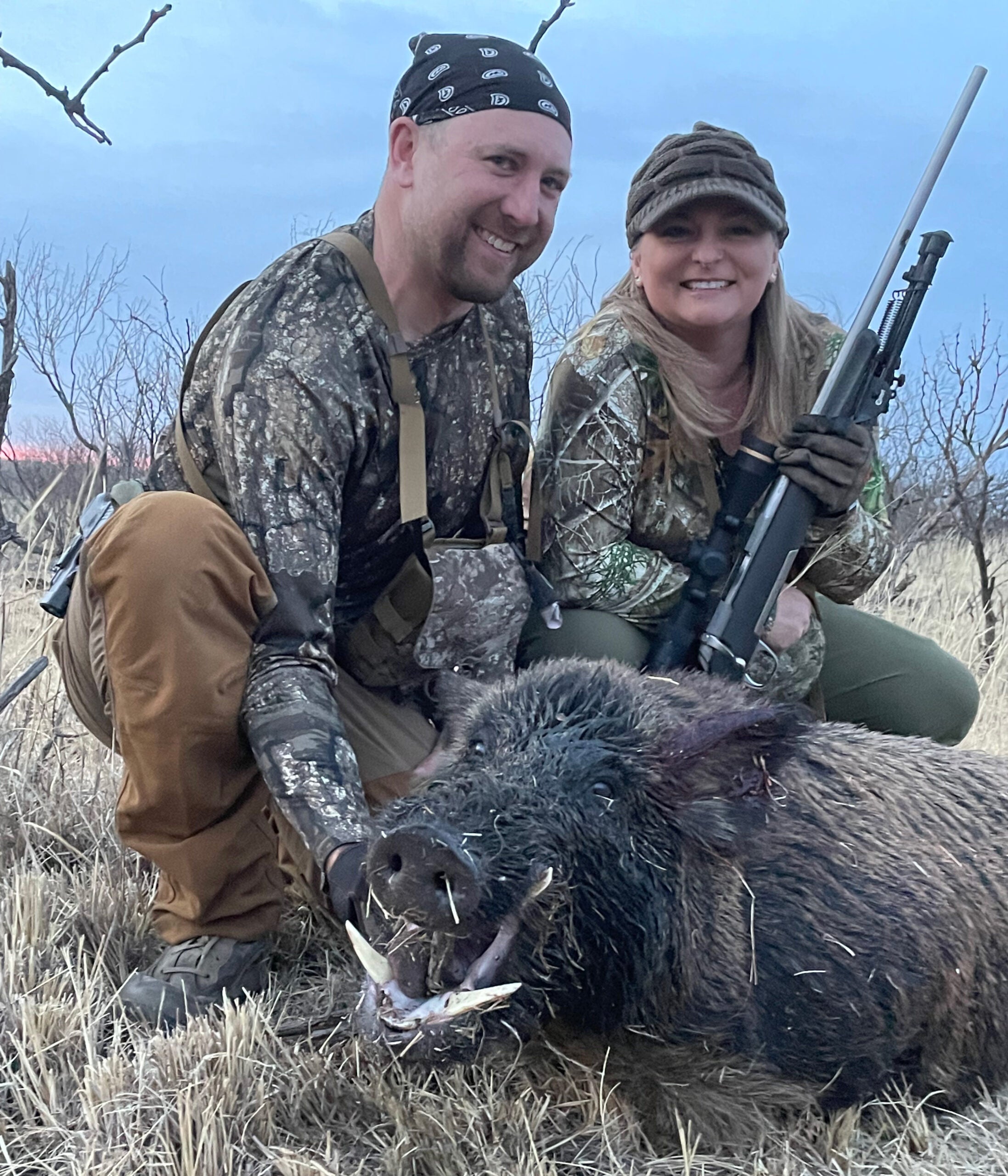 hunters with a boar hog taken in West Texas