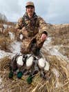 Ryan Chelius with a limit of ducks in the Pacific Flyway.
