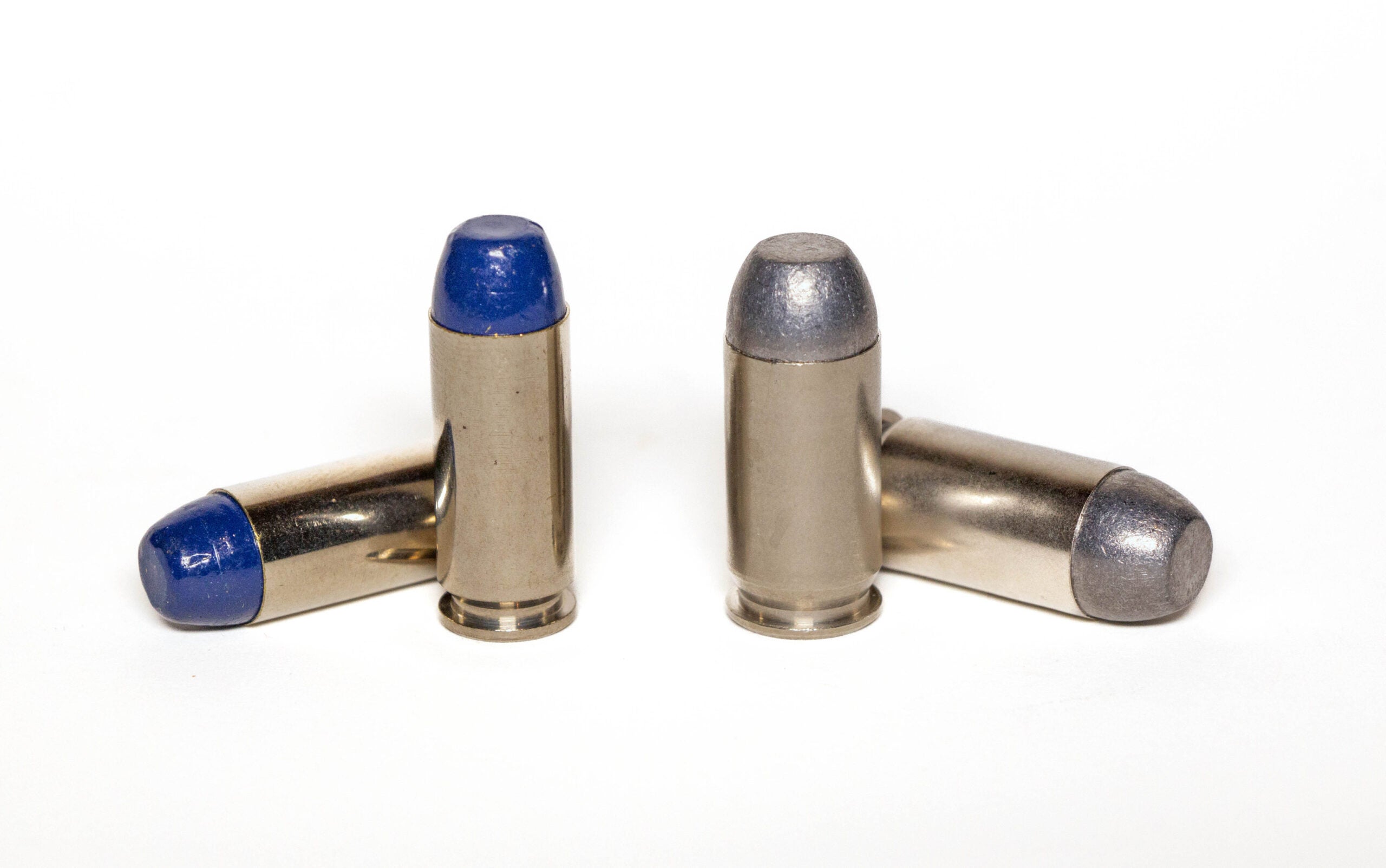 photo showing 10mm auto ammo on the left and 45 acp ammo on the right