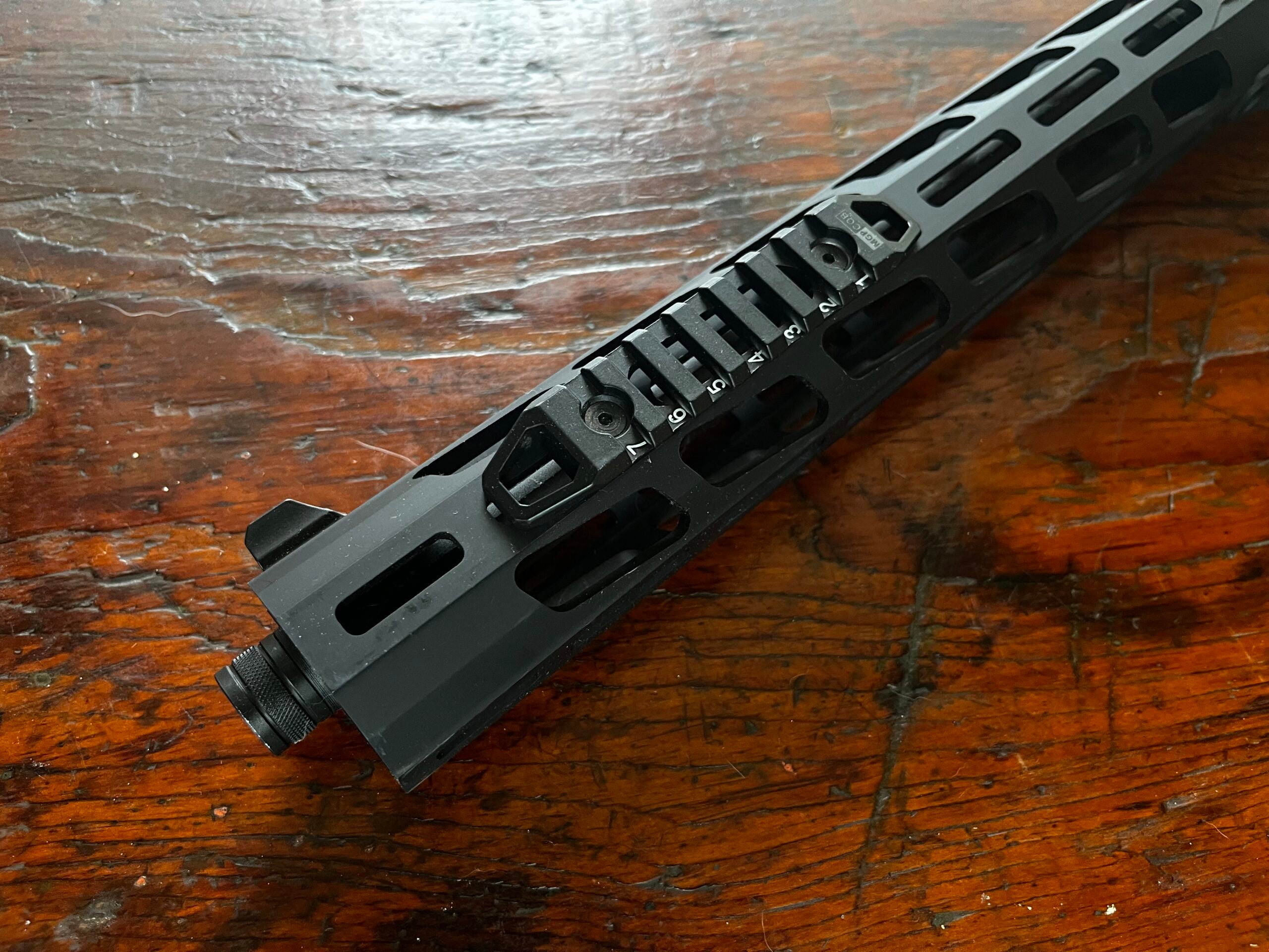 a section of rail attached via the M-Lok mounting system