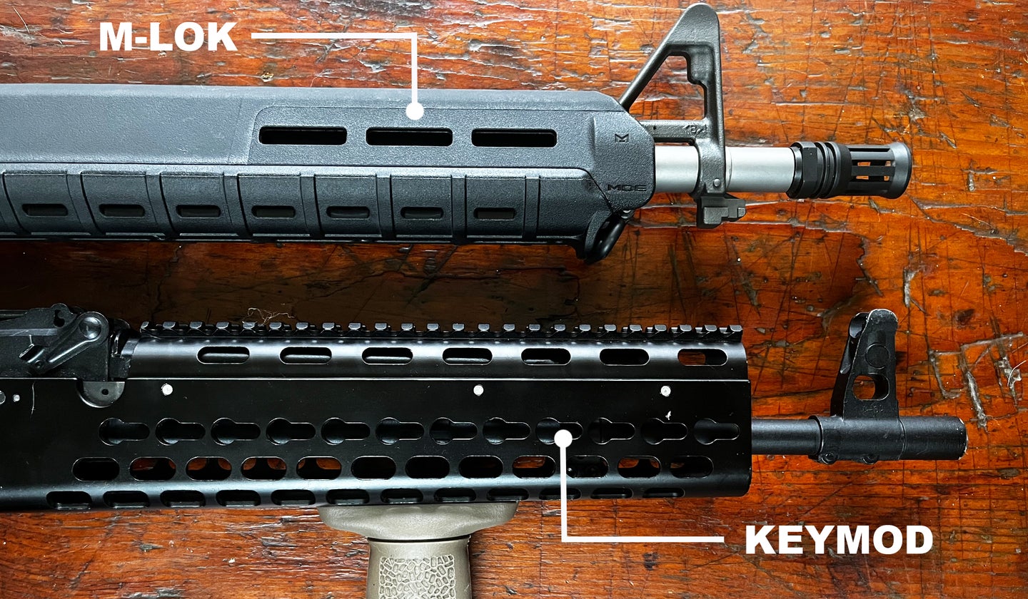 photo showing the difference between keymod, bottom, and mlok, top