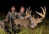 Mark Drury and his cameraman show off a huge Missouri nontypical whitetail buck