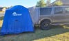 Napier Sportz SUV Tent set up on back of Ford Excursion