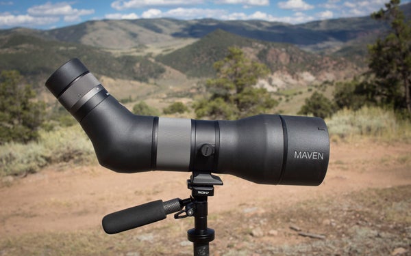Maven S.1 spotting scope on tripod with mountains in the background