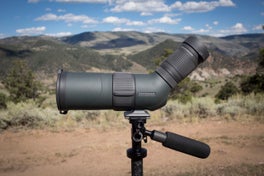 Vortex Razor HD spotting scope on tripod with mountains in the background