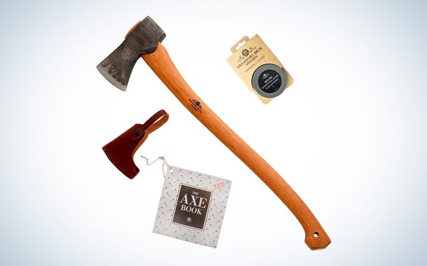 A traditional Gransfors forest axe with included accessories on a black and white gradient background.