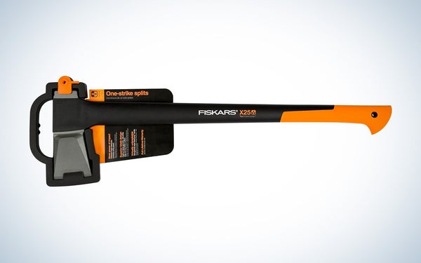 An orange and black Fiskars splitting axe on a black and white gradient background.