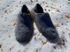 Chaco Women's Revel Moccasins sitting on snowy ground