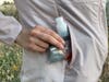 Platypus SoftBottle rolled up in hiker's pocket