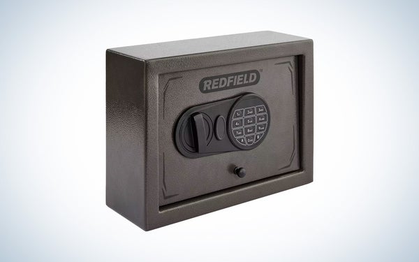 A gray and black Redfield drawer pistol lock box on a gray and white gradient background.