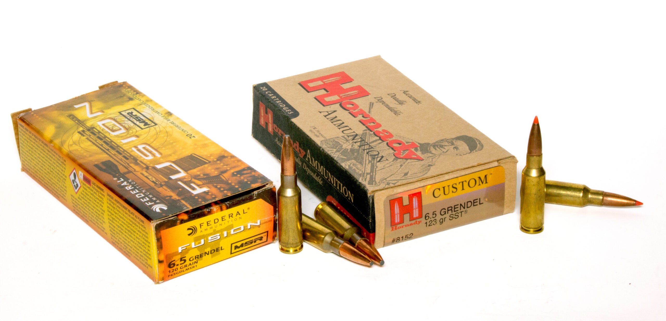 Two boxes of 6.5 Grendel ammo, plus several loose cartridges on a white background