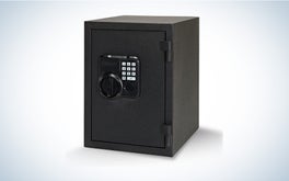 A black Hornady keypad safe on a black and white gradient background.