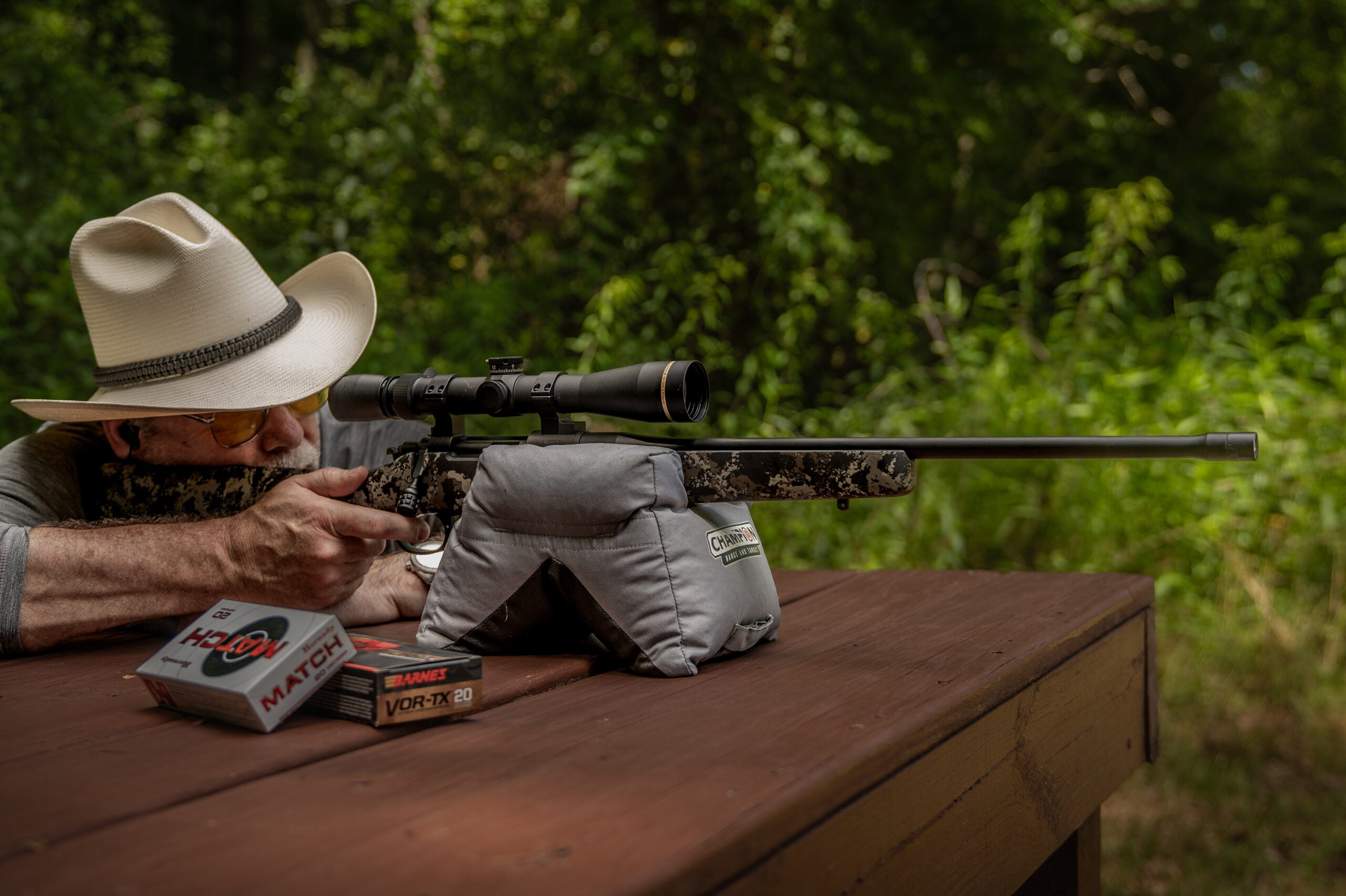 The author shoots a bolt-action rifle chambered in 308 Winchester for a bench rest.