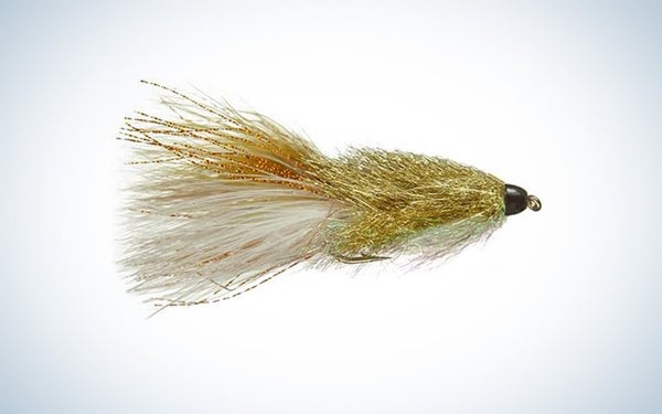 A sparkle minnow streamer fly for trout fishing shown on a gradient background